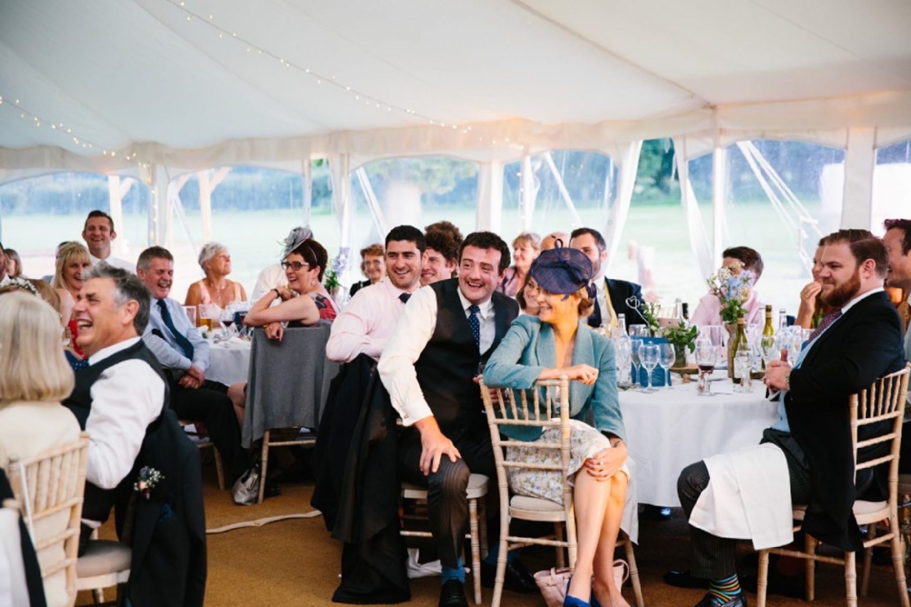 Laura and Andy's Wigwam Marquee Round Ended Sailcloth Tent Steyning Guests on Round tables